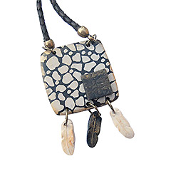 Picture: Polymeerklei juwelen met veertjes